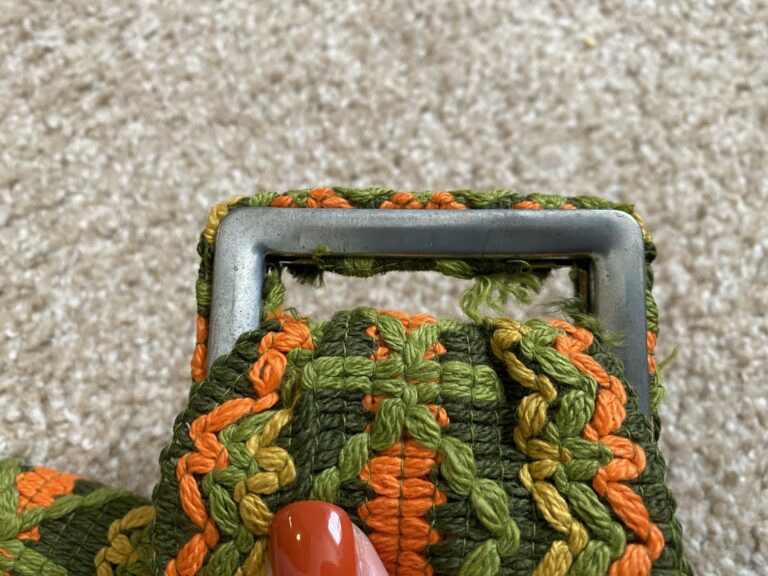 vintage green, yellow, and orange belt