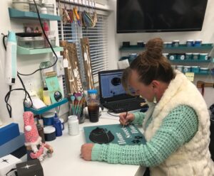 Natasha working in office