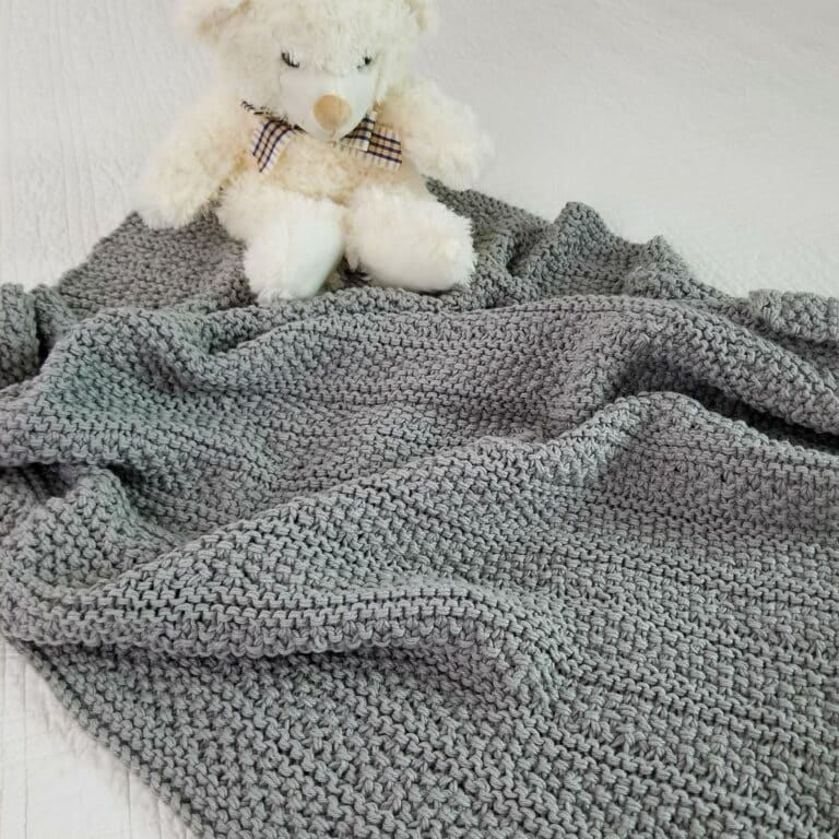 Sample of Delwood Baby Blanket knit with soft gray cotton yarn.