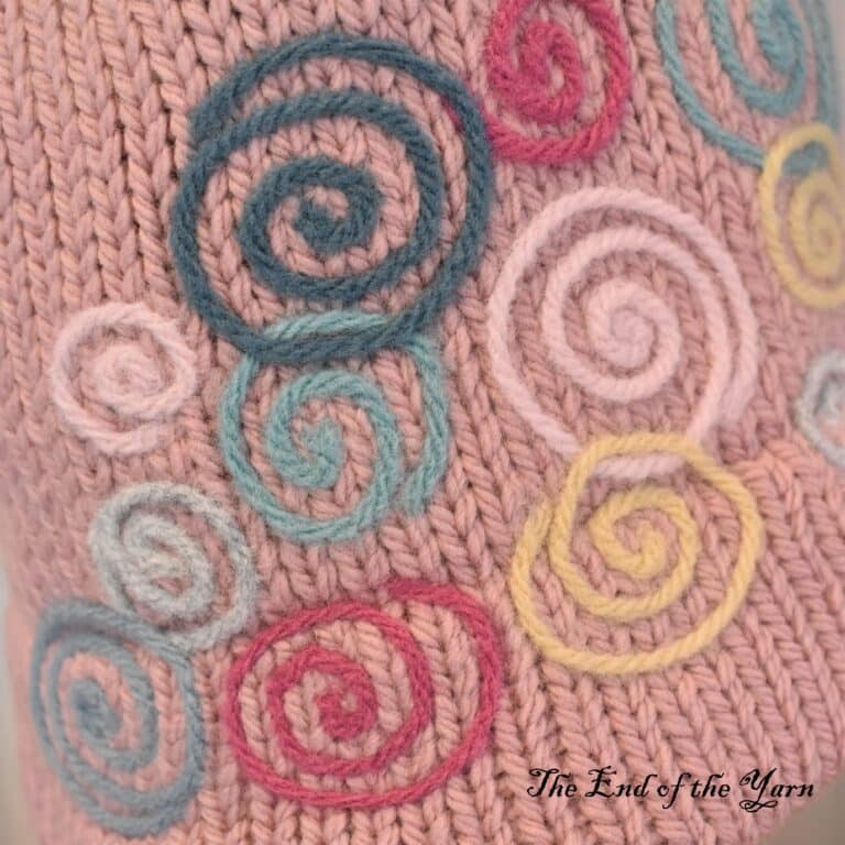 The swirls on the hat close up