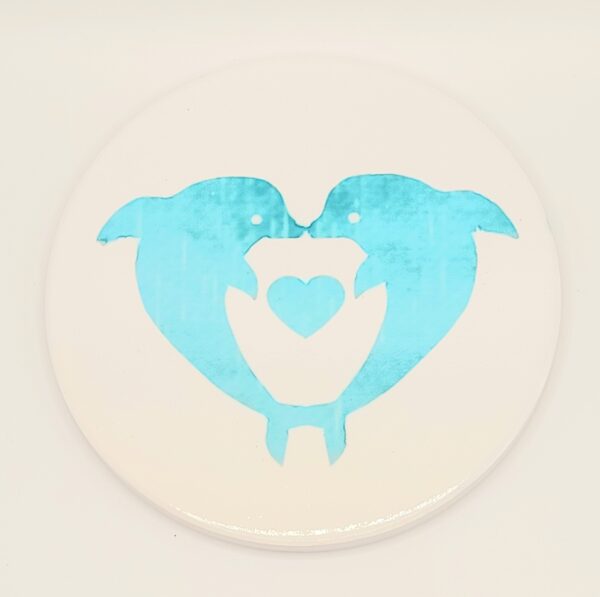kissing dolphin.co scaled