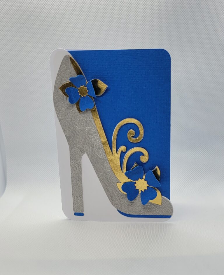 greeting card silver high heel, blue background