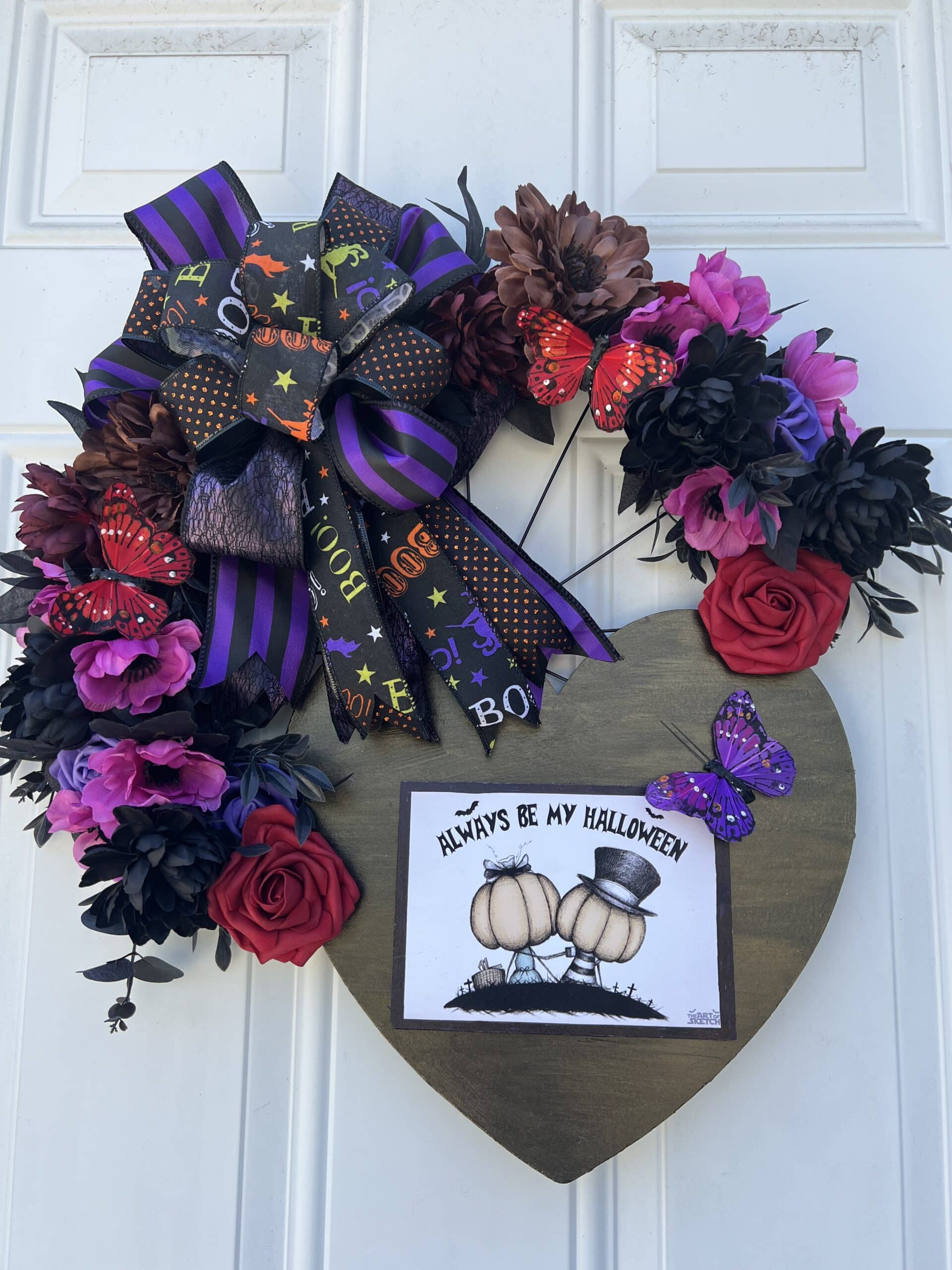 wire Halloween wreath, florals, wood heart, print
