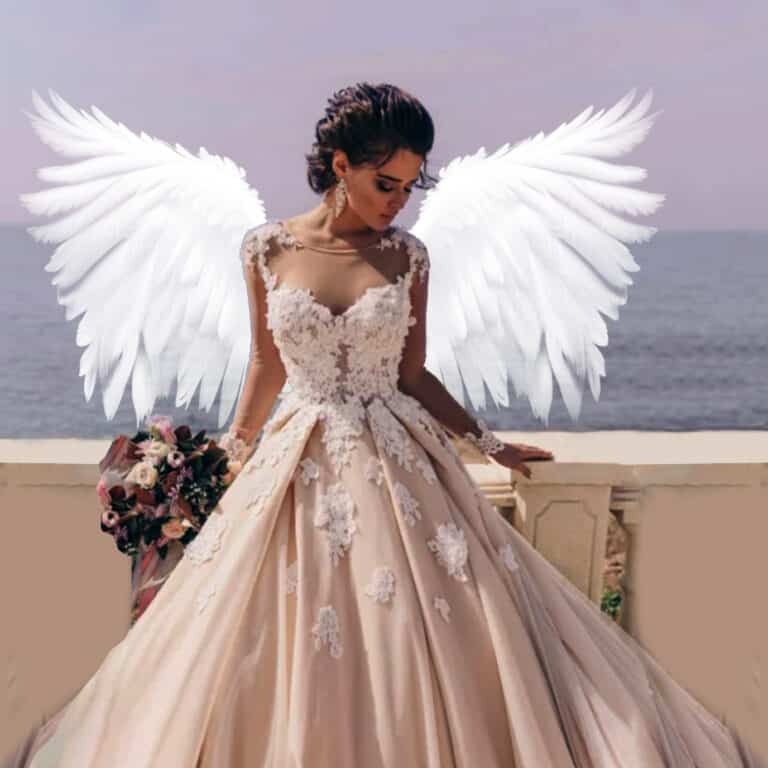 White angel wing overlay on photo of model