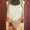 Boho purse features shades of orange patchwork design of cotton batiks. Sequins adds a touch of bling.