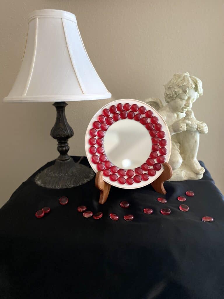 Beautiful white plate with glass red beads mirror decor 