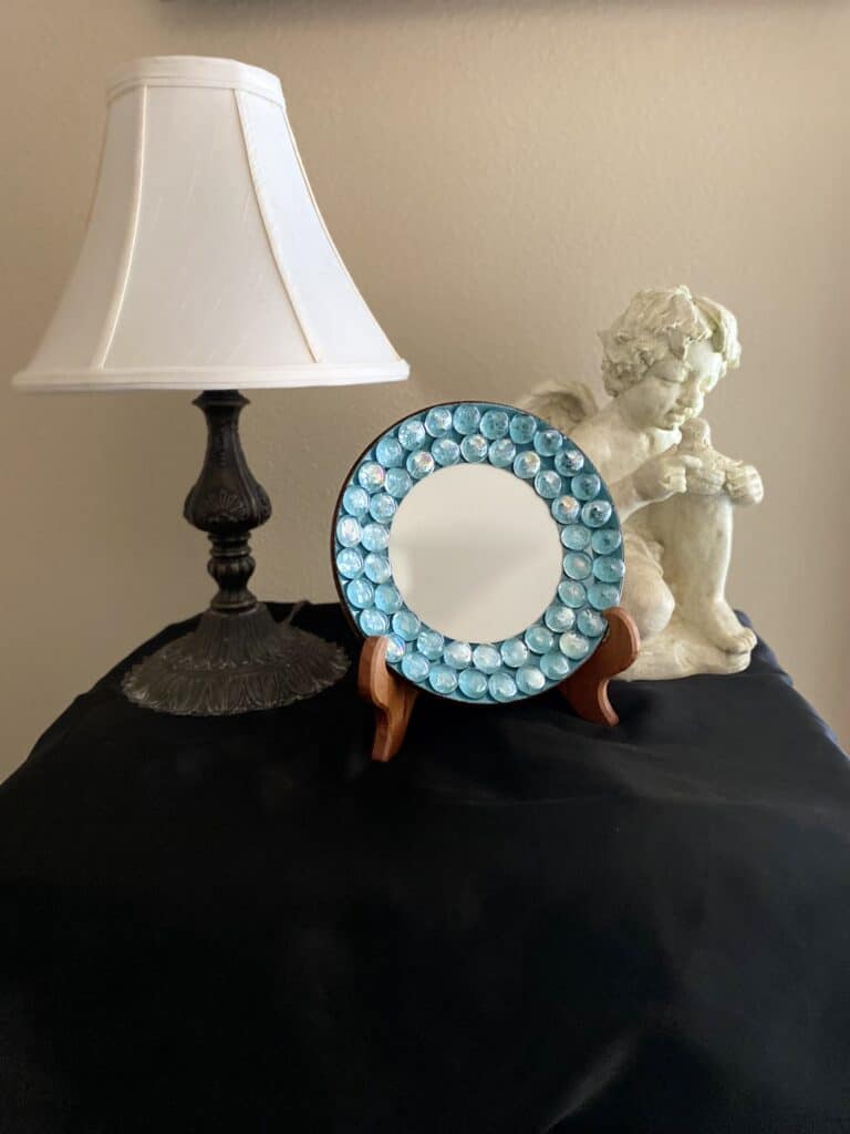 Beautiful blue/green plate with glass beads mirror.