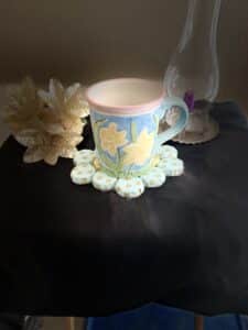 This beautiful handmade light green and yellow trivet is a practical and stylish addition to any kitchen.