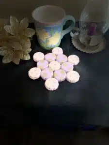 This beautiful handmade pink and purple trivet is a practical and stylish addition to any kitchen