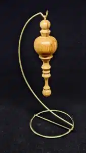 Handturned ornament inn Cherry and Beech
