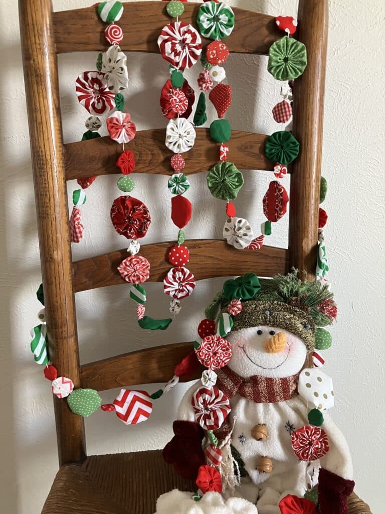 yoyo garland peppermint spearmint on chair snowman