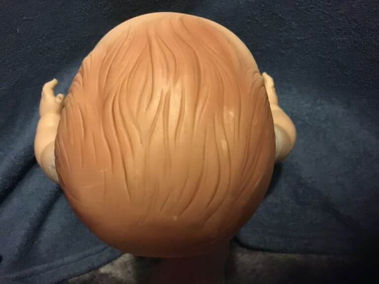 Old doll top of head