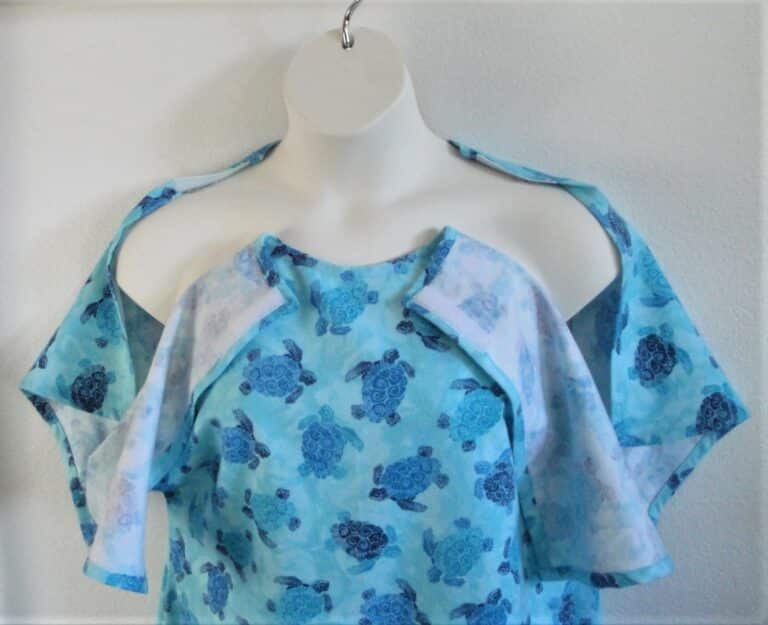 Sea Turtle flannel post surgery gown showing velcro opening at shoulders.