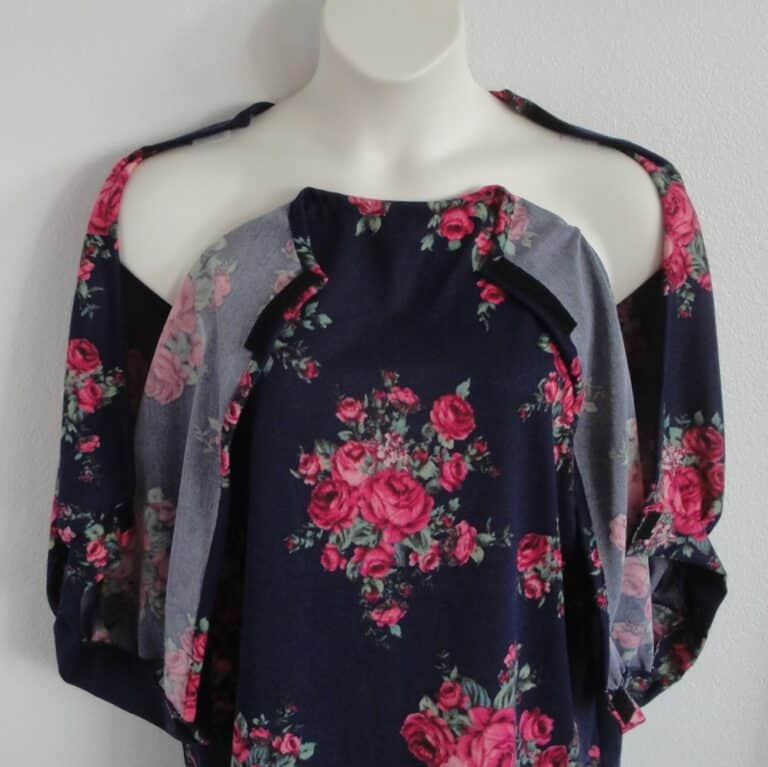Jan adaptive sweater showing sleeves open