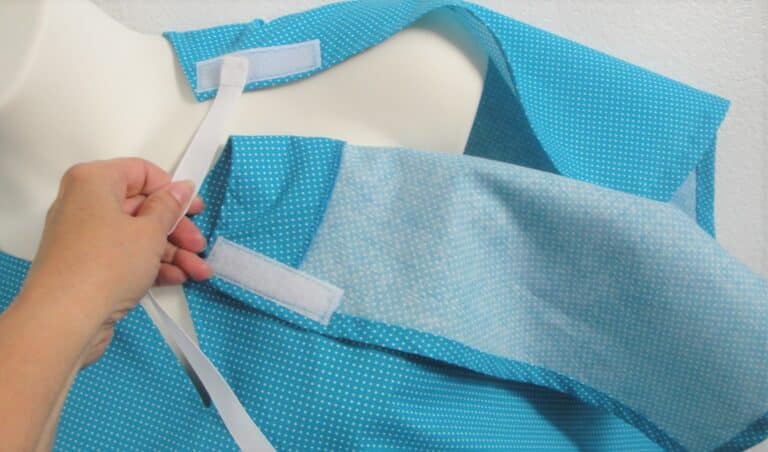 Turquoise dot post surgery Gracie shirt showing ribbon extension