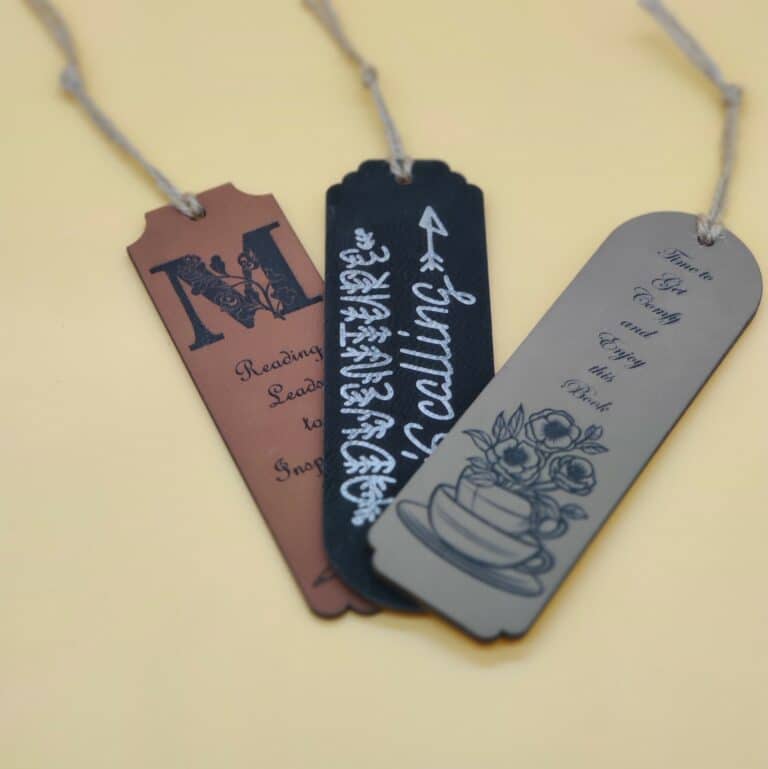 Custom leatherette and wood bookmarks.