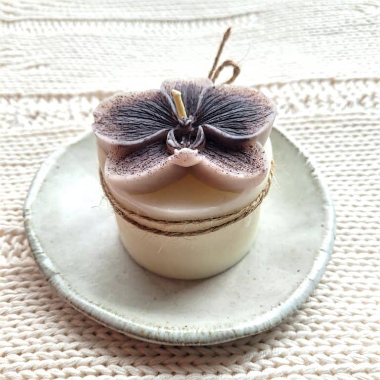 Beeswax candle with purple orchid
