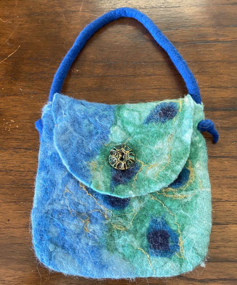blue alpaca handbag