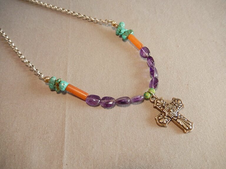 multi colored gemstone necklace with silver cross
