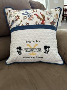 Yellowstone pillow with Cowgirl