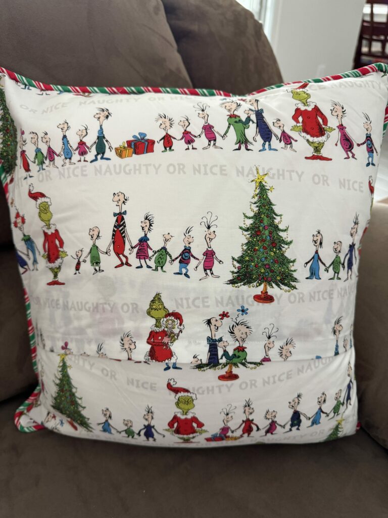 Pillow with white Whoville back side