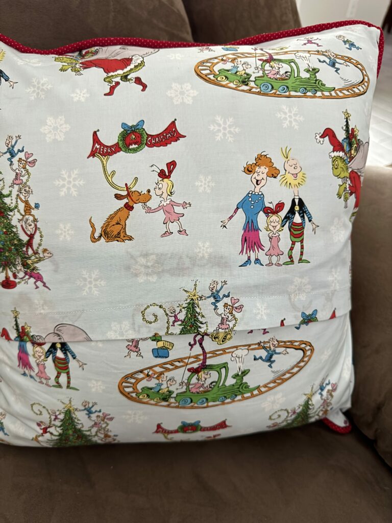 Pillow with Cindy Lou & family back side