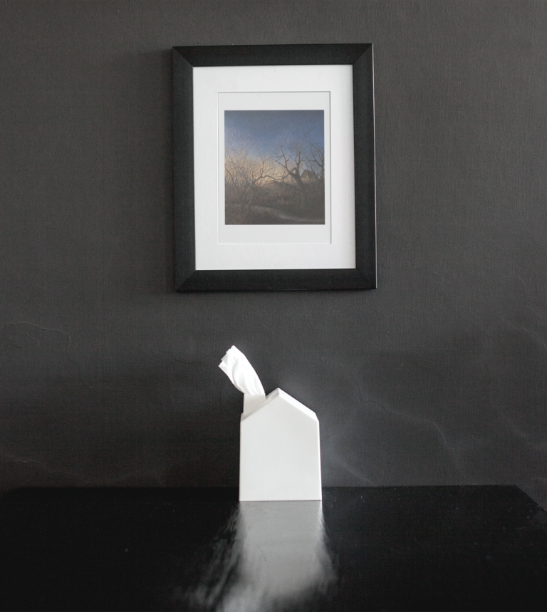 framed art print mockup on a black wall over a black table a14688 2