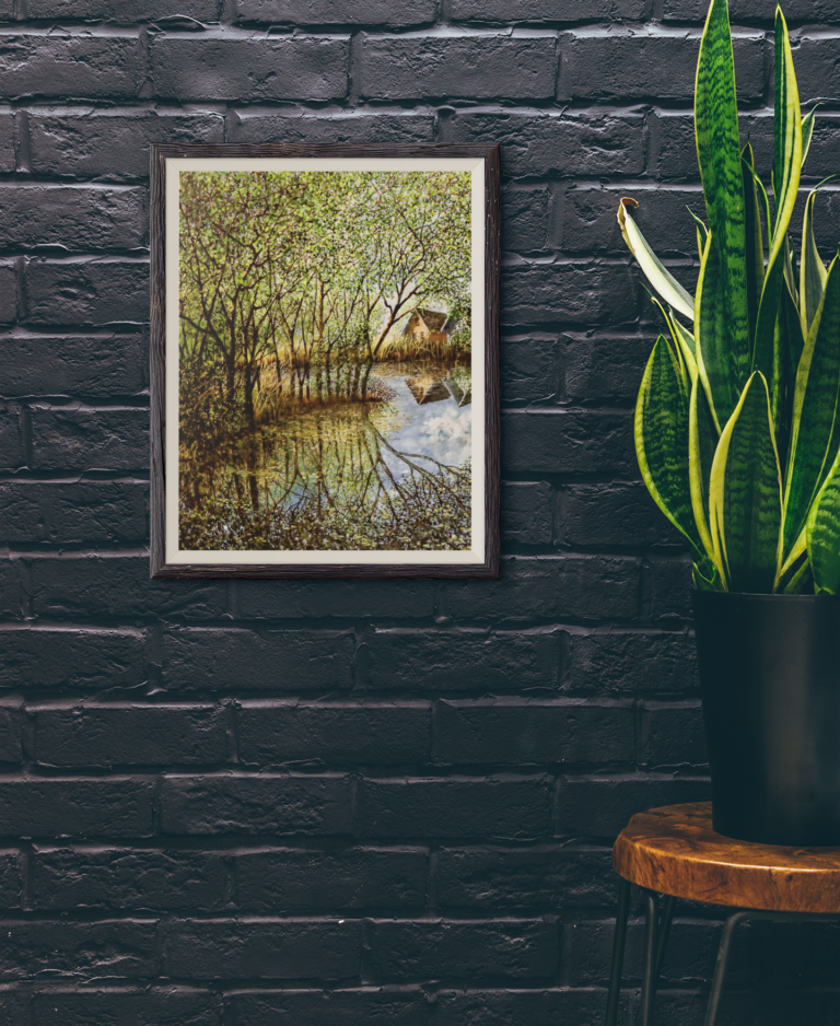 mockup featuring an art print hanging next to a plant 3918 el1 1