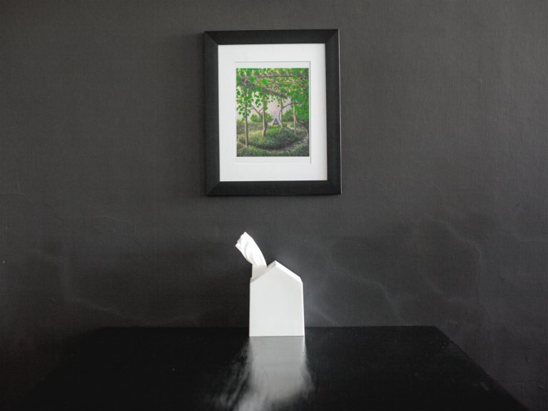 framed art print mockup on a black wall over a black table a14688 11