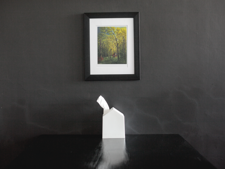framed art print mockup on a black wall over a black table a14688 12