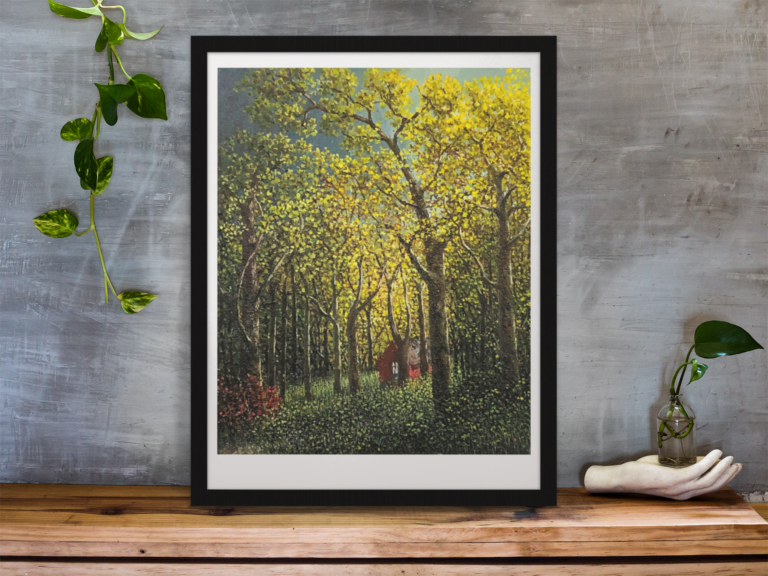framed art print standing on a wooden desk against a concrete wall near a hand decoration a10403 14