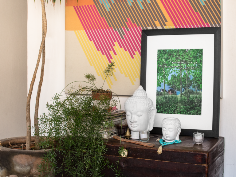 framed art print template on a table with decorations near a plant a14774 17
