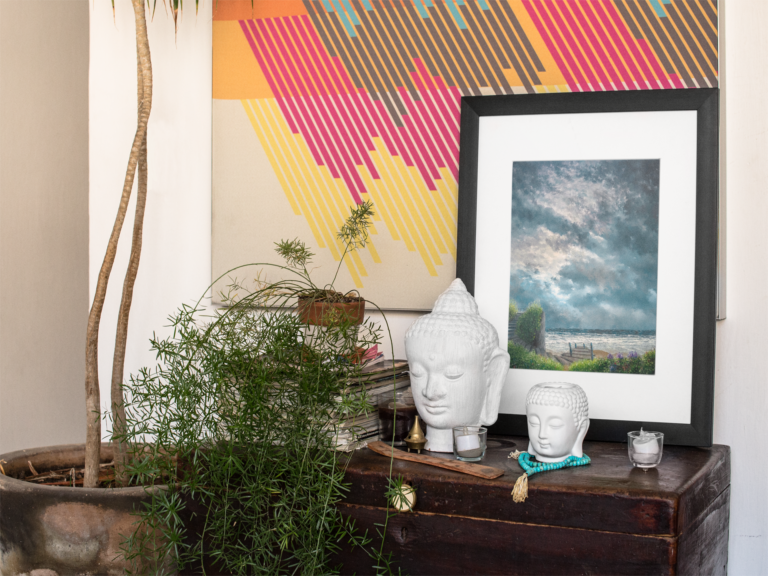 framed art print template on a table with decorations near a plant a14774 19