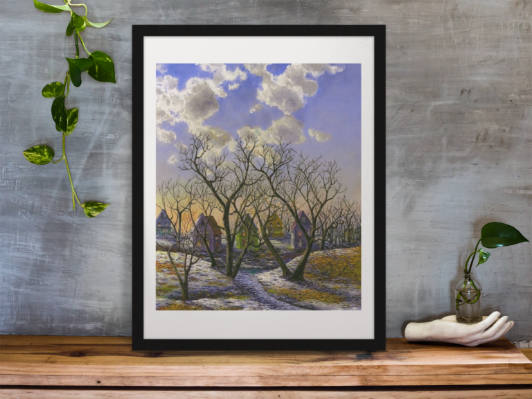 framed art print standing on a wooden desk against a concrete wall near a hand decoration a10403