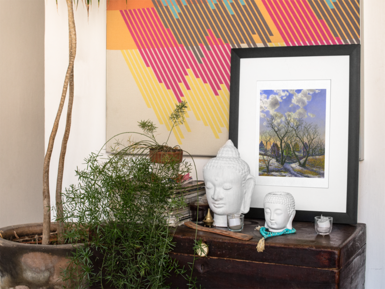 framed art print template on a table with decorations near a plant a14774