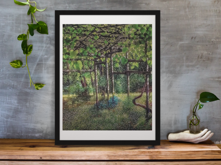 framed art print standing on a wooden desk against a concrete wall near a hand decoration a10403 2