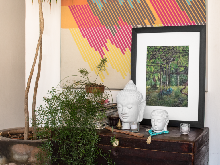 framed art print template on a table with decorations near a plant a14774 1