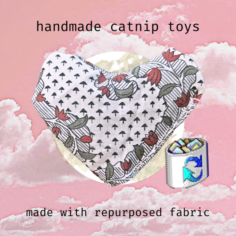 Image of a catnip toy with a flowery fabric pattern over a background of pink clouds. Win98 recycling bin icon in bottom right corner.