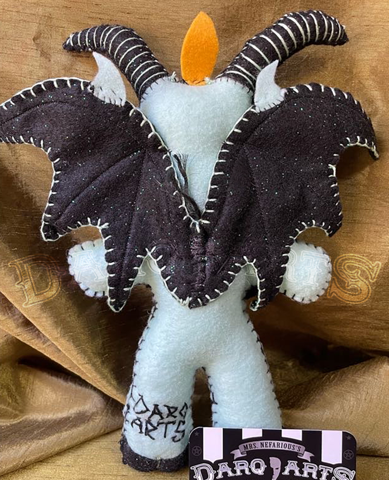 Baphomet back full view of adorable soft felt poppet handmade by Mrs. Nefarious of Darq.arts. Aqua body with black wings, horns, hooves and tummy. Eternal flame on top of head.
