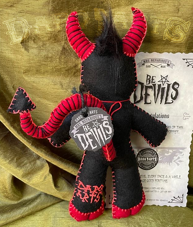 Bedevils - My name is Bedlam. I have a black felt body with bright red accents. Back view.