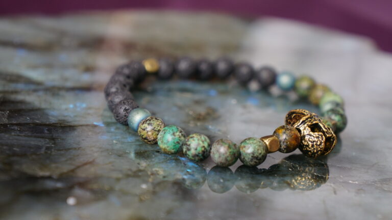 Black and green bracelet with viking helmet