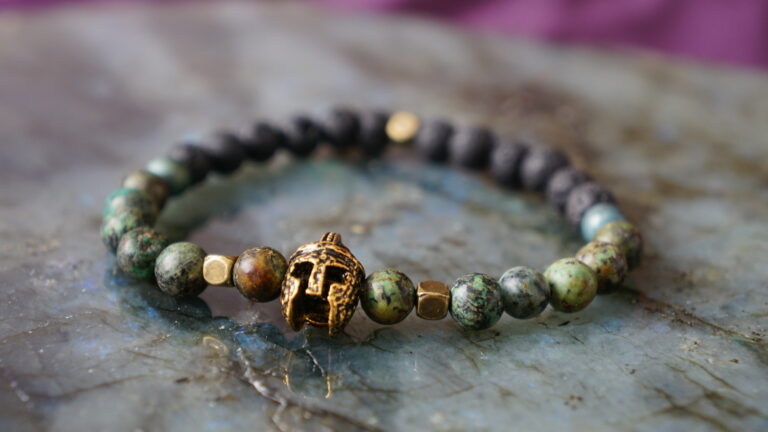Black and green bracelet with viking helmet