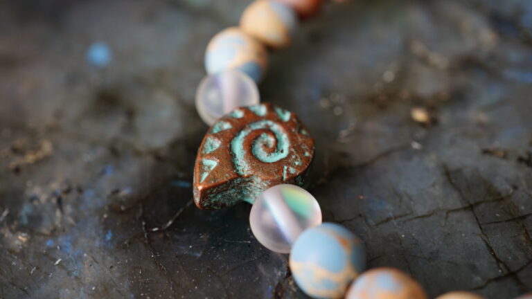 Beaded bracelet with copper shell