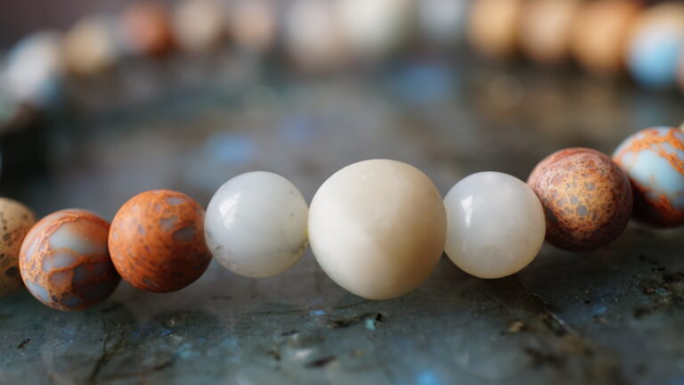 Beaded bracelet with copper shell