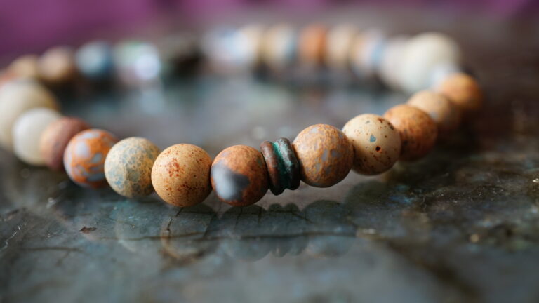 Beaded bracelet with copper shell