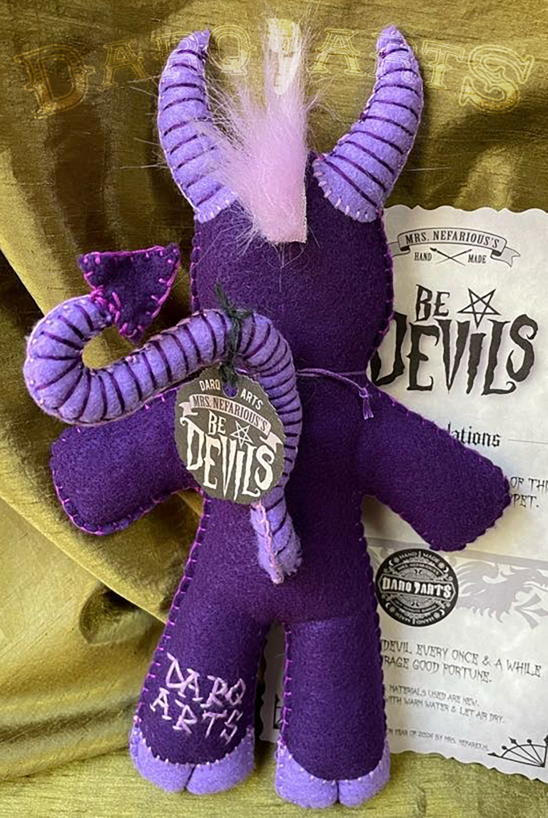 Bedevils. Backside view. My name is Scarum. I have a purple felt body with lavender accents. Full back view.