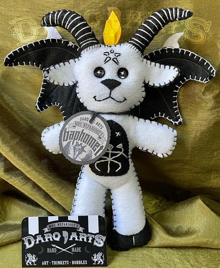 Baphomet front full view of adorable soft felt poppet handmade by Mrs. Nefarious of Darq.arts. Sparkle white body with black wings, horns, hooves and tummy. Eternal flame on top of head.