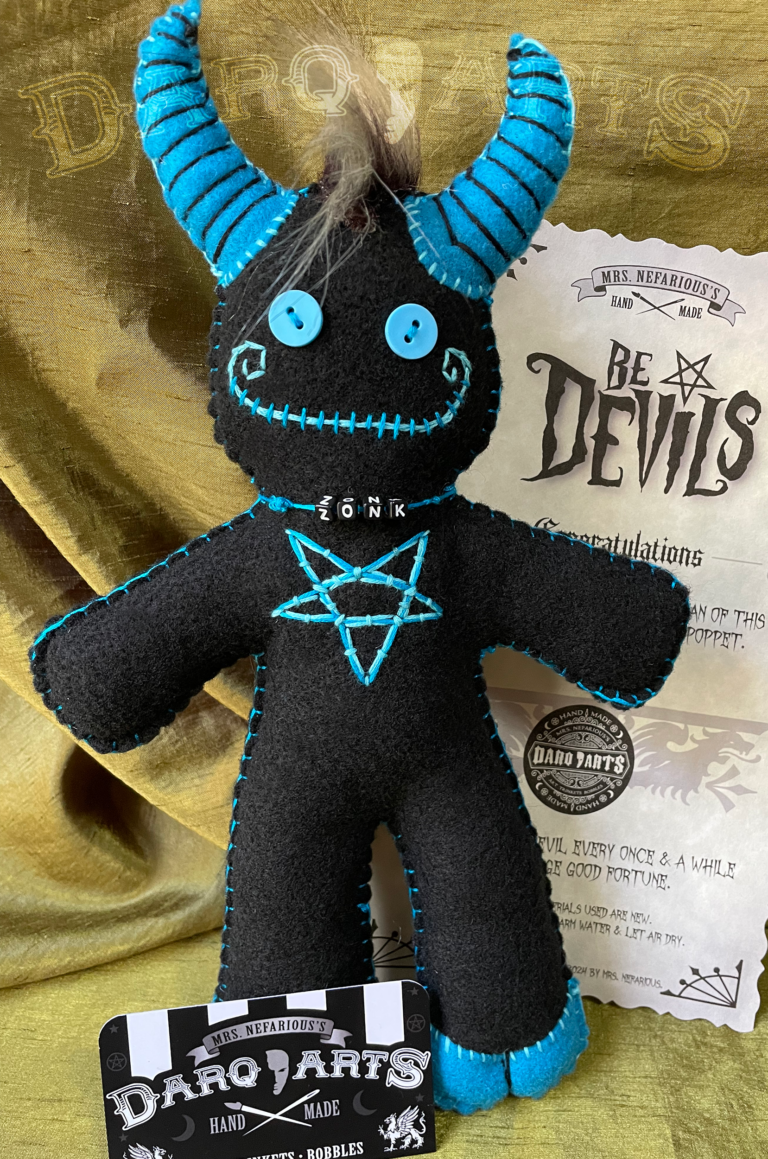 Bedevils - Zonk. Black soft felt body with cyan horns, tail, hooves and reversed pentagram. Close up back view.