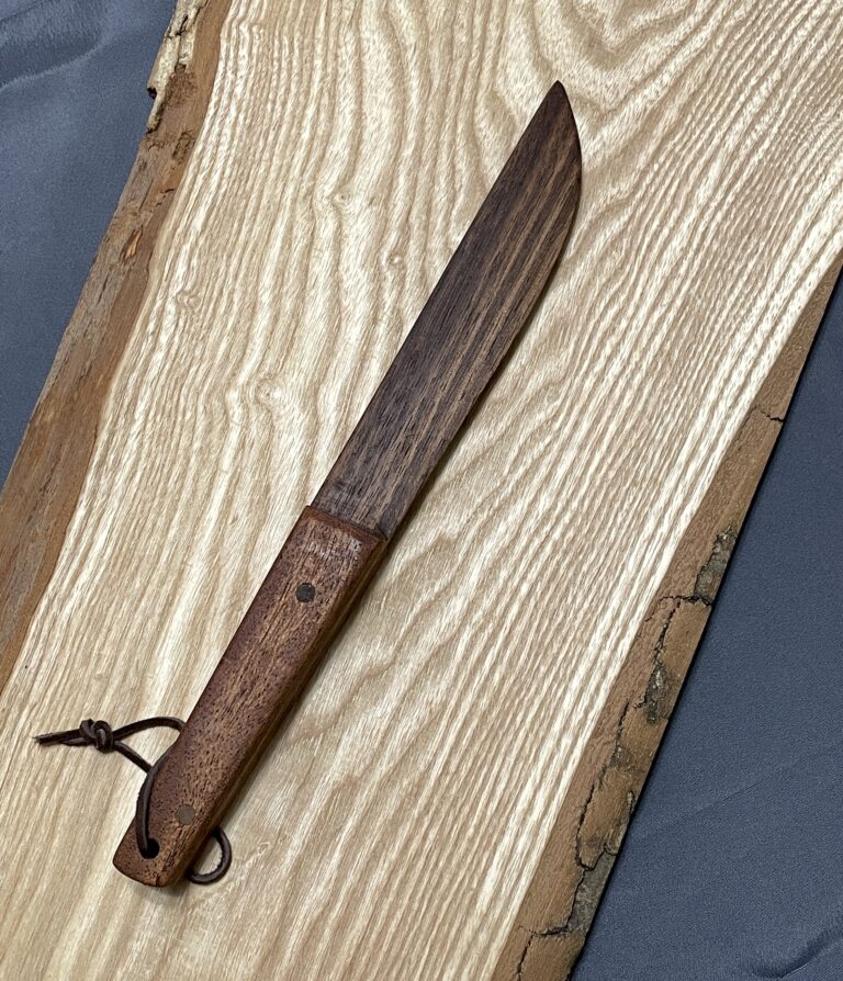 Image of handmade walnut and mahogany wooden cake knife