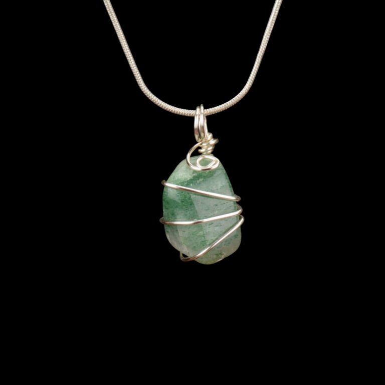 Green Aventurine tumbled stone wrapped in silver craft wire. The pendant is hanging on a silver chain.
